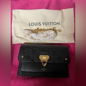 Louis Vuitton Vavin Chain Wallet in Empreinte Leather.